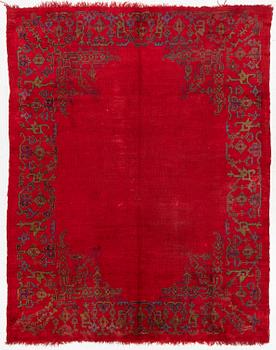 An antique Ushak carpet, West Anatolia, approx. 327 x 250.