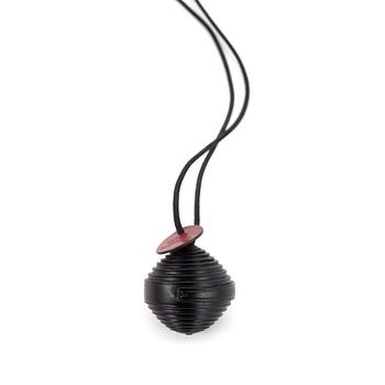 HERMÈS, a black leather necklace.