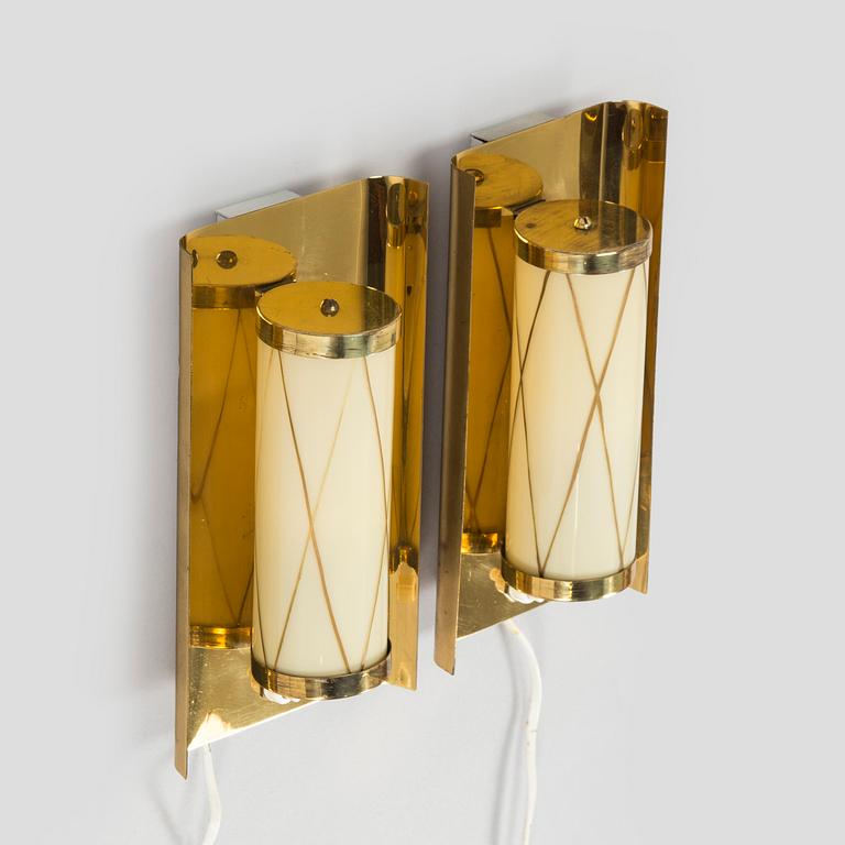 A pair of mid 20th century wall lights for Aris, Arisuo, Finland.