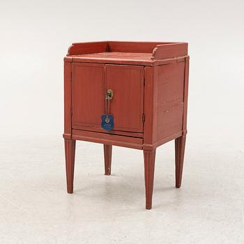 A painted Gustavian bedside cabinet from around the year 1800.