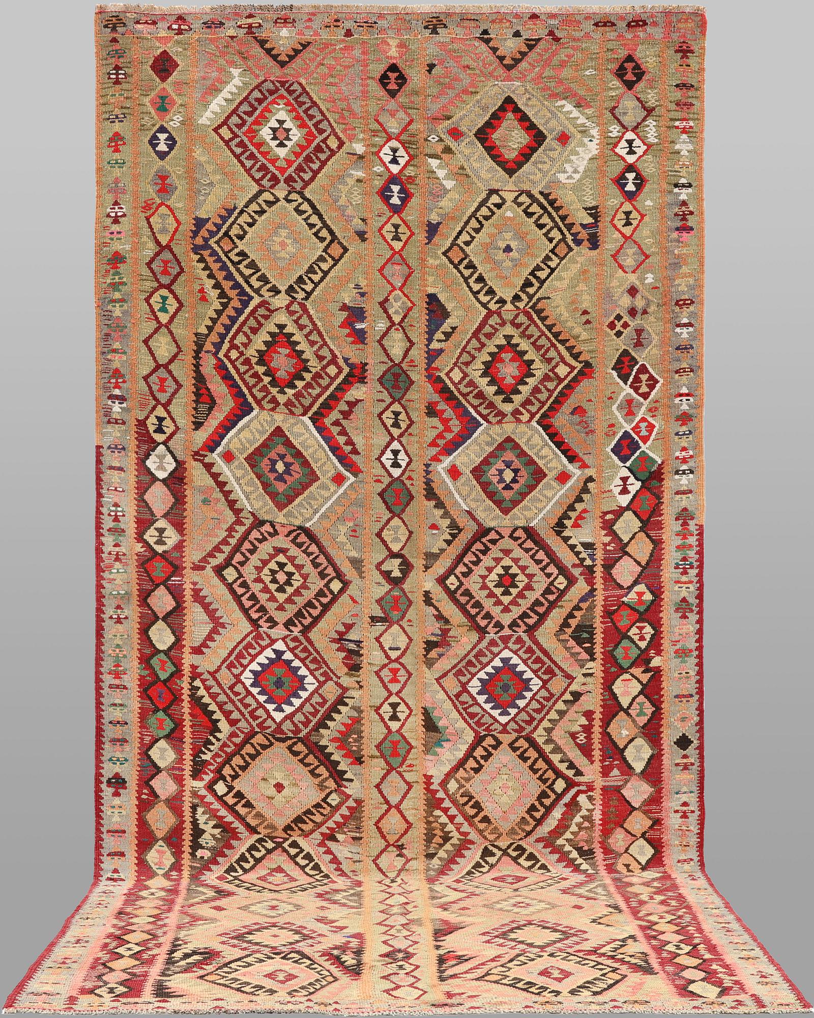 A Nomad Kelim Kord carpet, 387 x 185 cm.