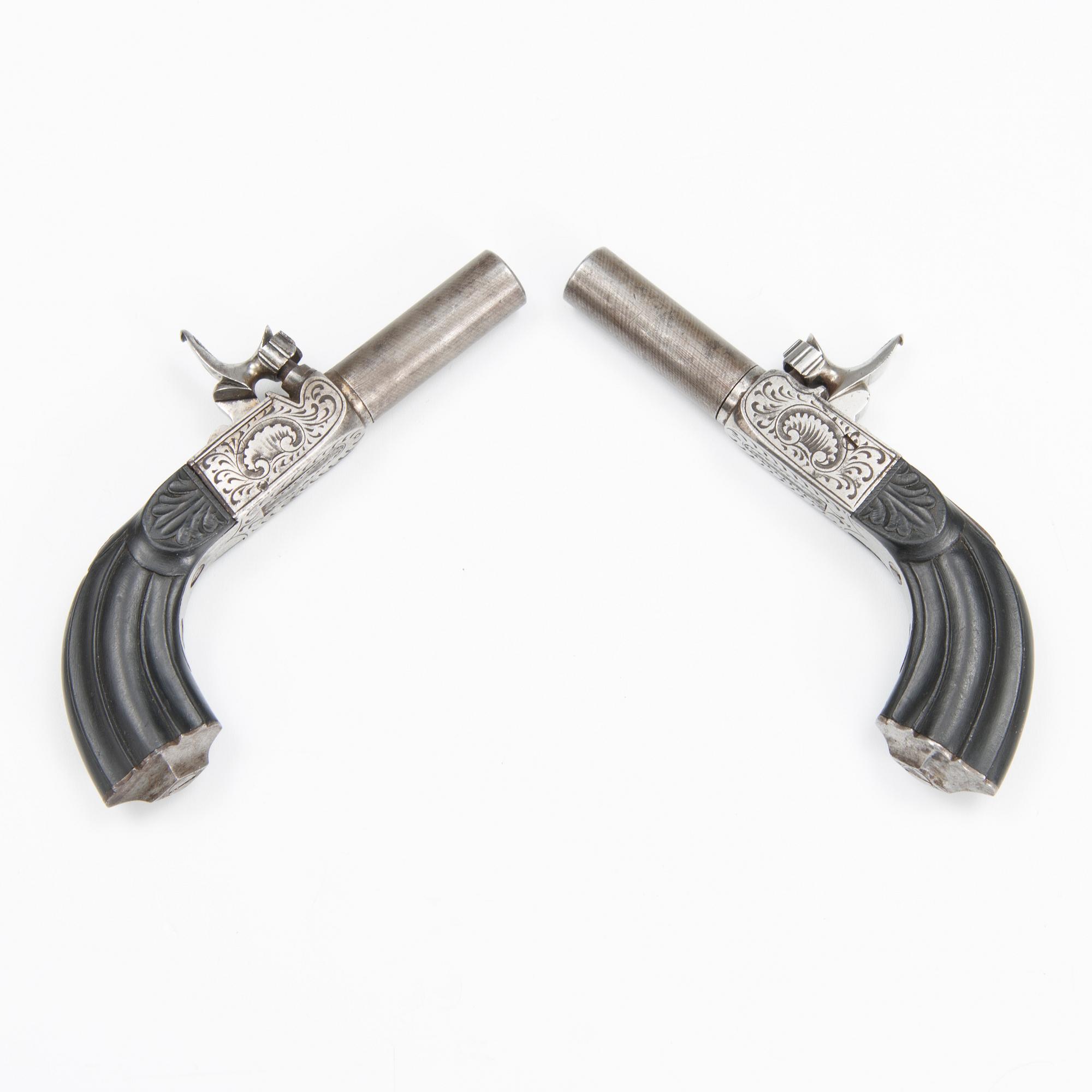 A pair of mid 19th Century Belgian percussion pistols.