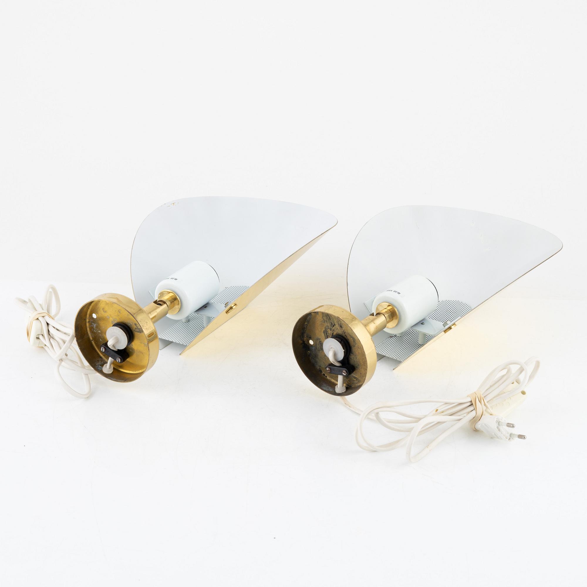 A pair of model 10302 brass wall lights, Aneta, Växjö.