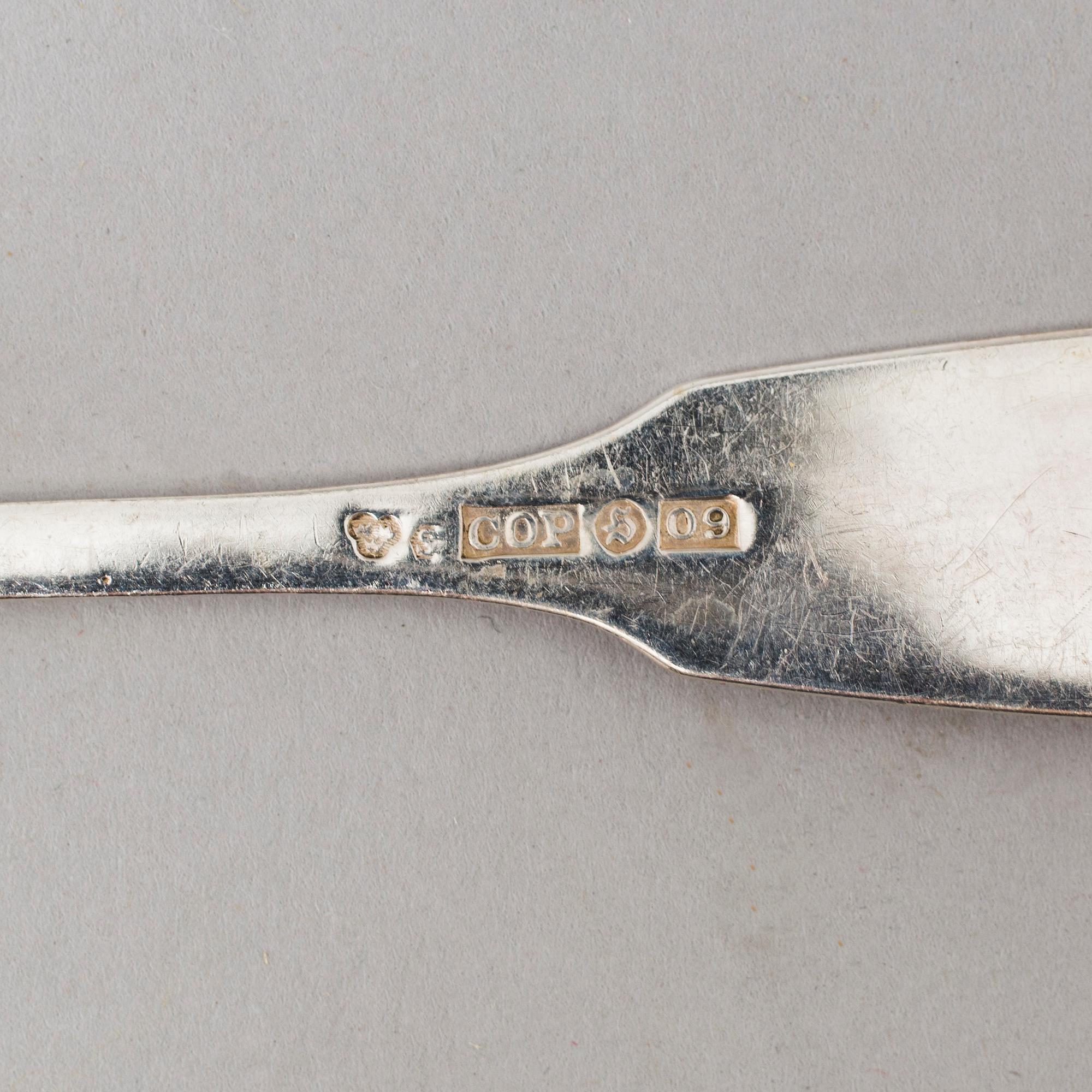 a lot of 24 silver spoons by C O Persson AB in Haparanda, Sweden. Weight ca 522 grams.