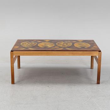 A walnut coffee table, 1960's/1970's, signed Baco.