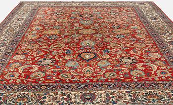 A carpet, semi-antique, Qum, ca 433 x 323 cm.