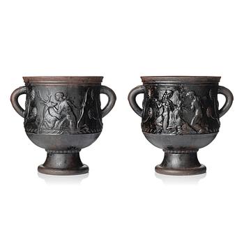 250. Ivar Johnsson, a pair of Swedish Grace cast iron garden urns 'Diana', Näfveqvarn, Sweden.