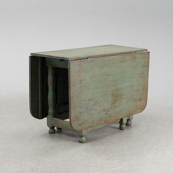 A painted pine gate-leg table, 19th Century.