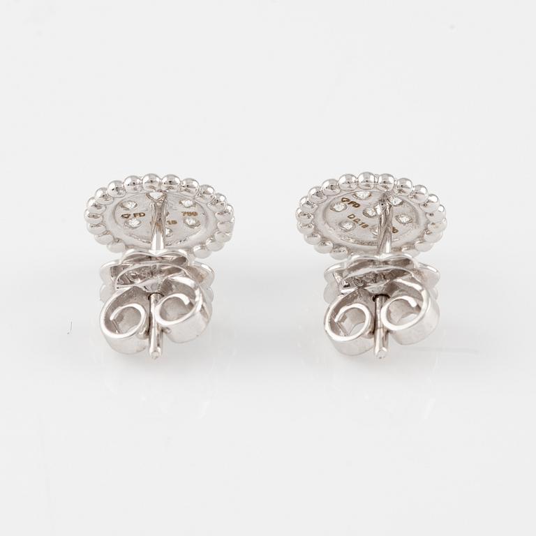 Earrings with brilliant-cut diamonds.