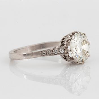 A platinum ring set with an old-cut diamond ca 2.25 cts quality ca K/L vs.
