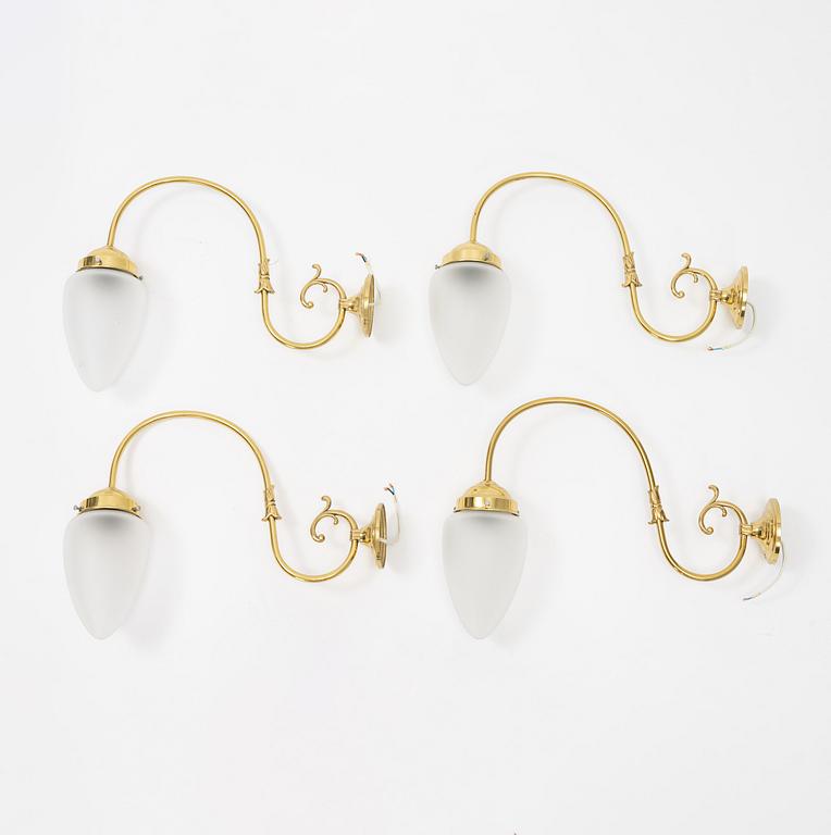Four brass wall lights, second half of the 20th Century.