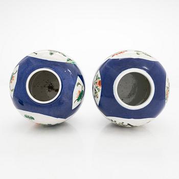 A pair of famille verte jars with covers, China mid 20th century.