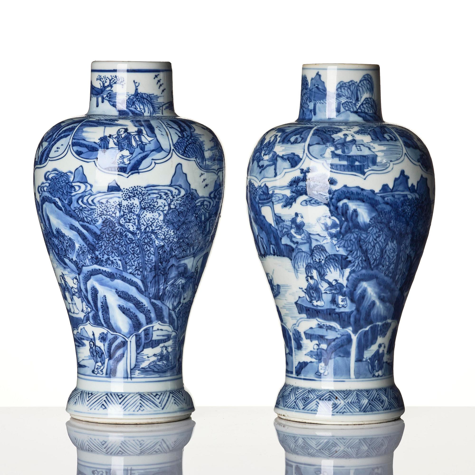A pair of blue and white 'landscape' vases, Qing dynasty, Kangxi (1662-1722).