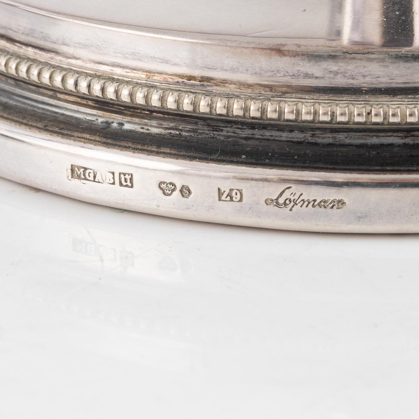 Eric Löfman, ljusstakar, ett par, silver, KG Markströms, Uppsala 1979.