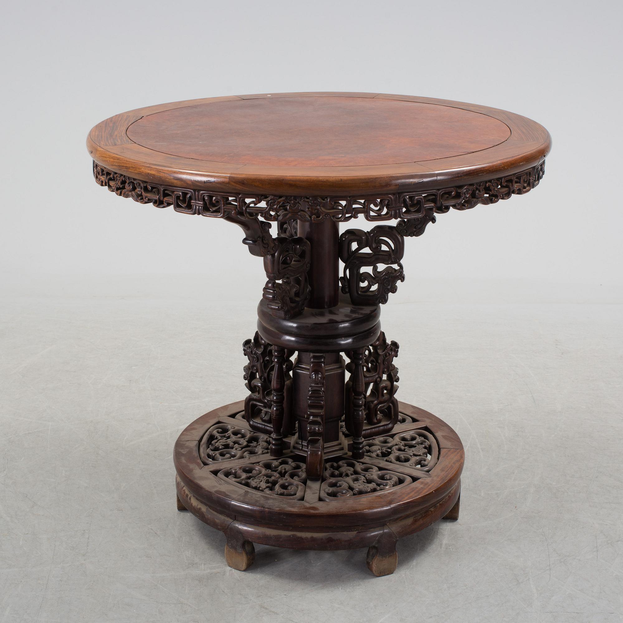 A Chinese wooden table, early 20th century.