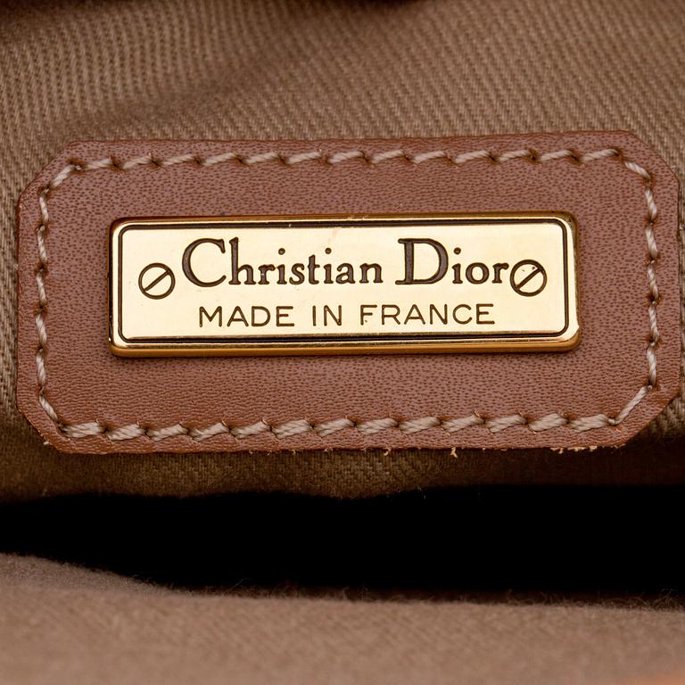 CHRISTIAN DIOR, a brown bag briefcase.