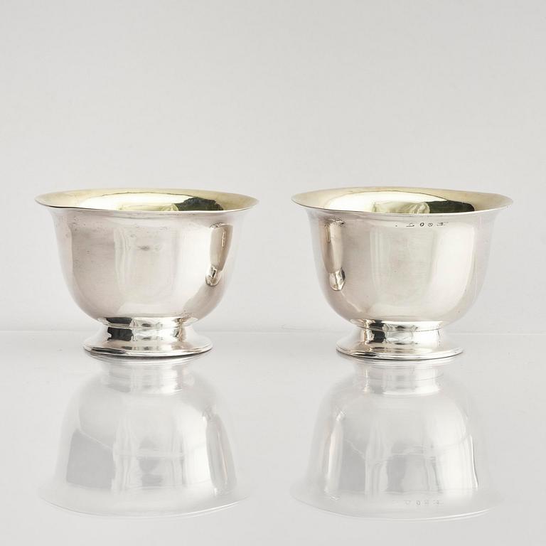 A pair of Swedish parcel-gilt silver dessert bowls with stand, mark of Gustaf Möllenborg, Stockholm 1830.
