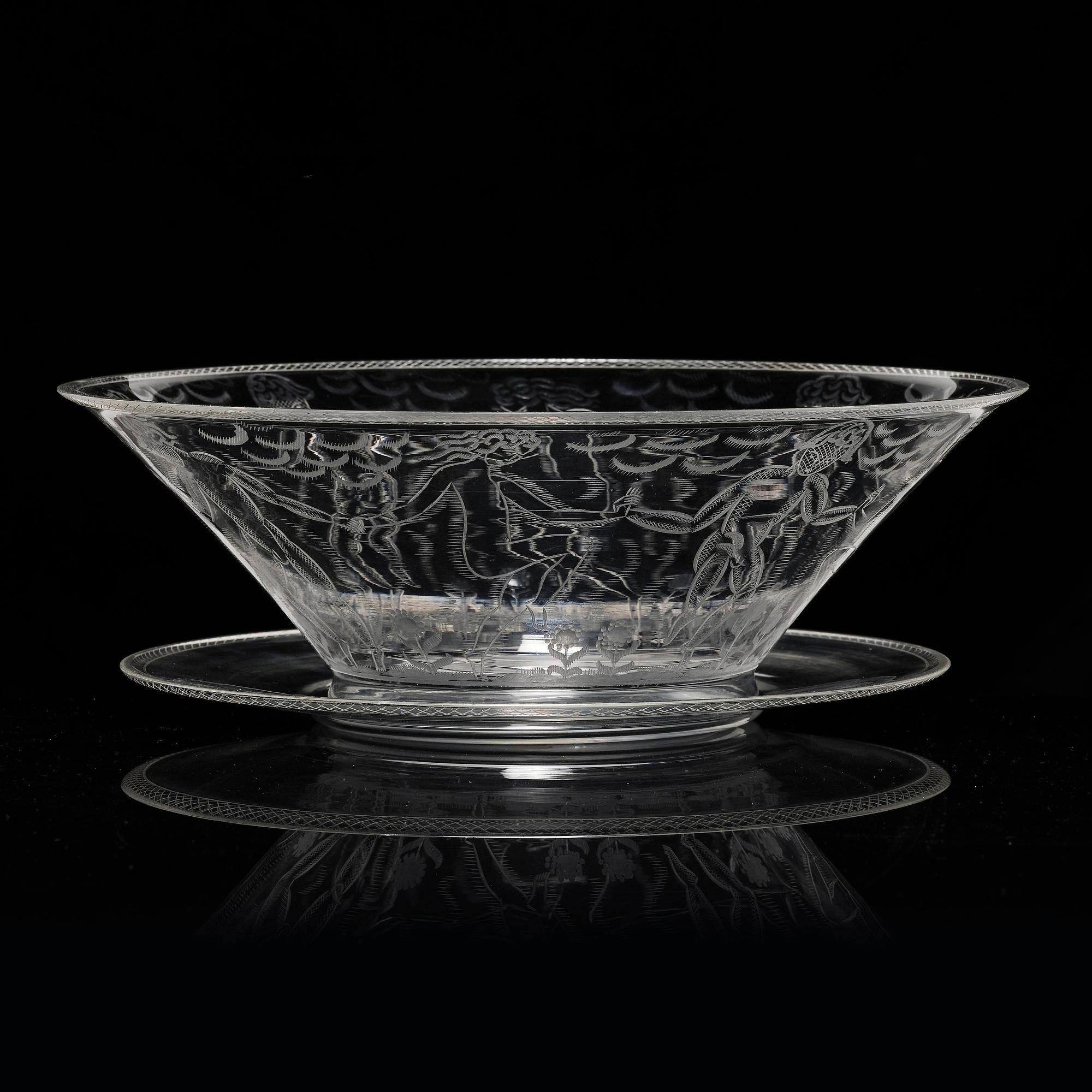 Edward Hald, an engraved glass bowl with plate, Orrefors, Sweden, 1926, model 305, engraved by Emil Goldmann.