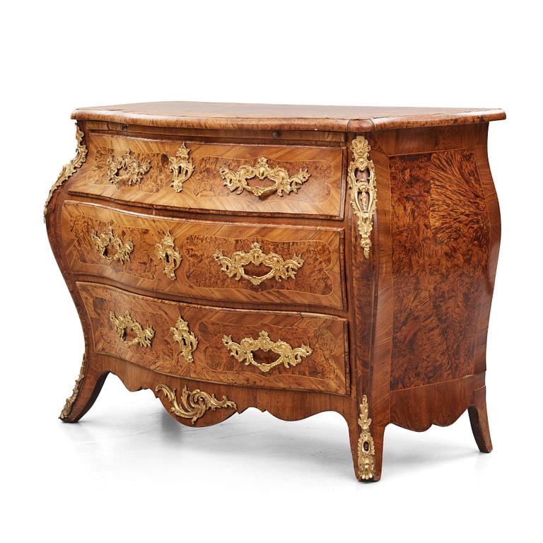 A burr-alder and gilt brass-mounted rococo commode by J. Sjölin (master 1767-1785).