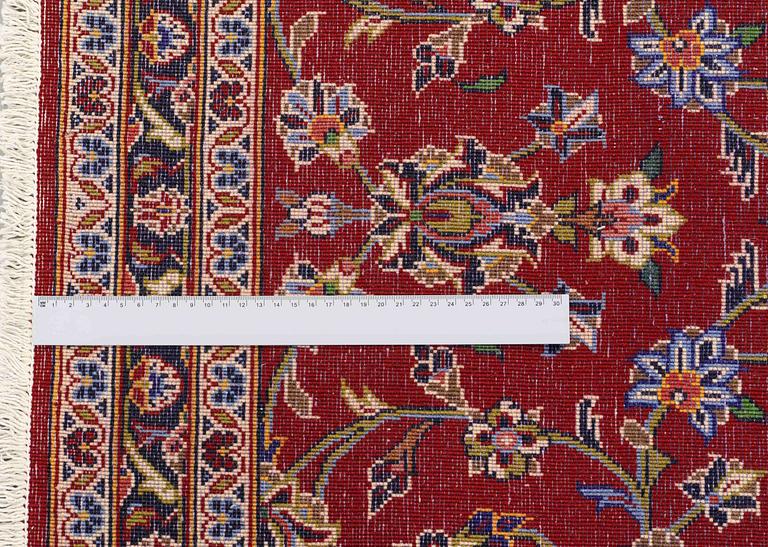 A runner from Kashan, around 500 x 93 cm.