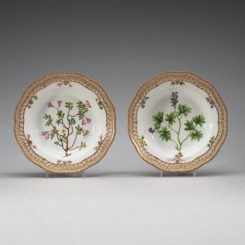 A set of 12 Royal Copenhagen 'Flora Danica' soup dishes, Denmark, early 20th Century.