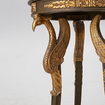 A pair of Empire-style armchairs with an end table, second half of the 20th century.
