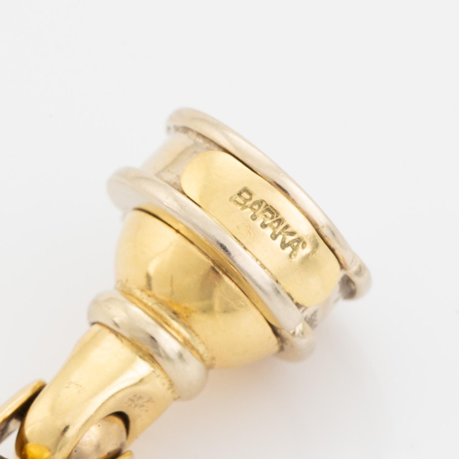 An 18K gold necklace/bracelet combination.