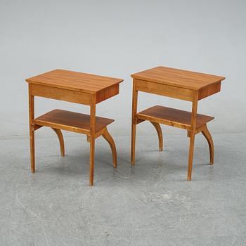 A pair of teak and birch bedside tables, mid 20th Century.