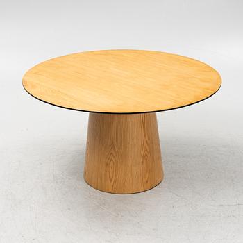 A 'Social' oak veneered table by Decotique.