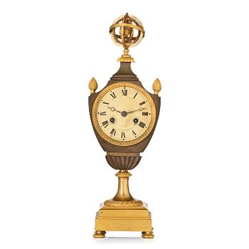 142. A French Empire ormolu and patinated bronze mantel clock, early 19th century,.