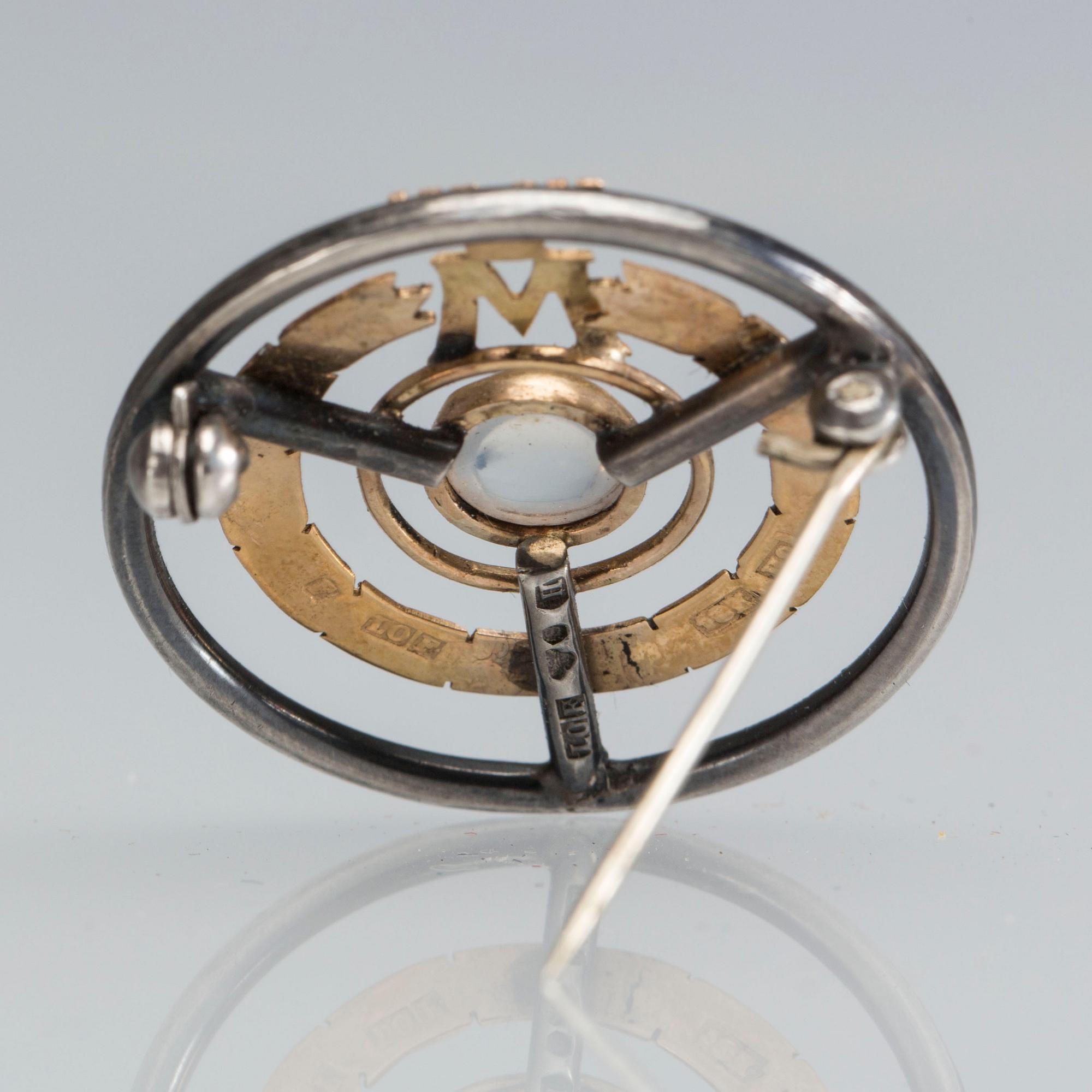 MÄRKE/BROSCH, Motormännens riksförbund, silver och 18k guld. Tot 6,5 g.