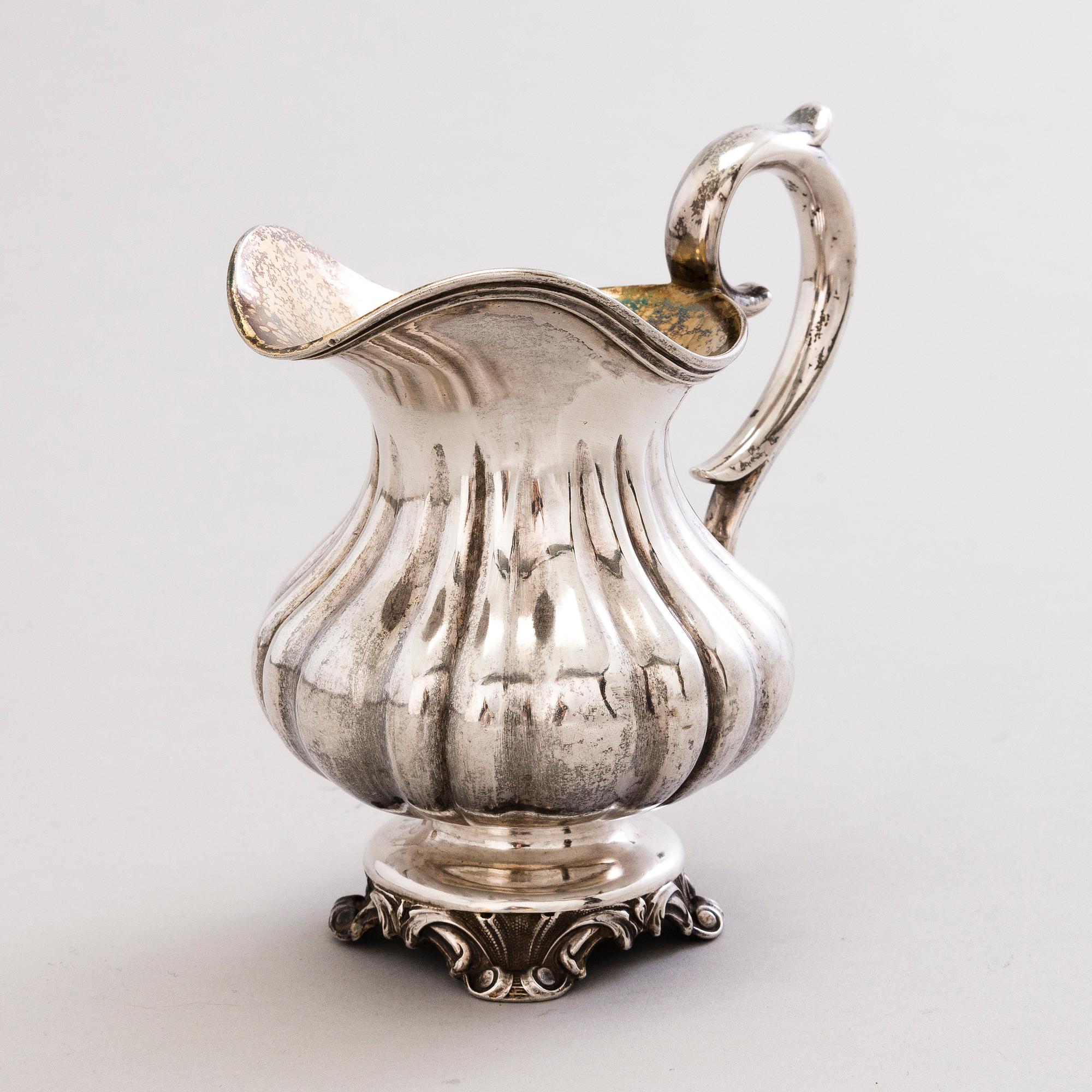 A Latvian silver cream jug, mark of Carl Theodor Beyermann, Riga, 1853.