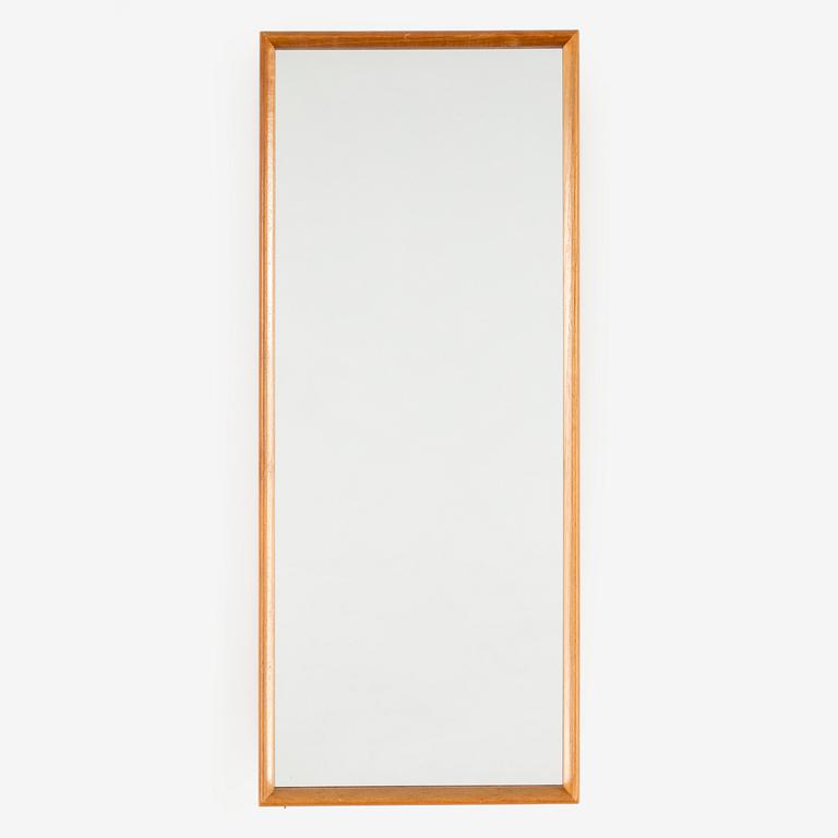 A SWEDISH MIRROR AND TABLE, oak and teak, signed with label "Eriksmåla glas". 1960s.