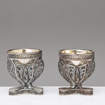 A pair of 19th century parcel-gilt silver salt-cellars, unidentified marks.