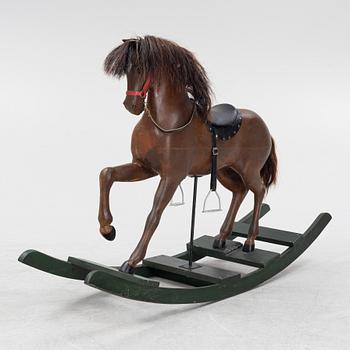 An early 20th century rocking horse.