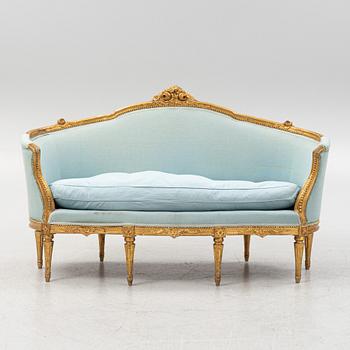 Karmstolar, ett par, samt soffa, Louis XVI-stil, omkring år 1900.