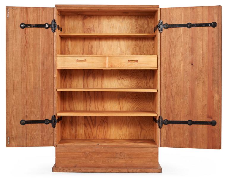 An Axel Einar Hjorth pine cabinet, Nordiska Kompaniet, Stockholm 1930's.