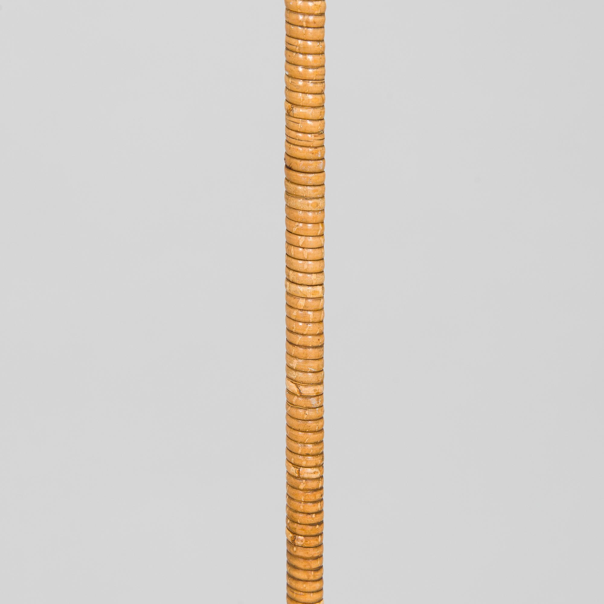 Paavo Tynell, a mid-20th century K10-10 floor lamp for Taito.