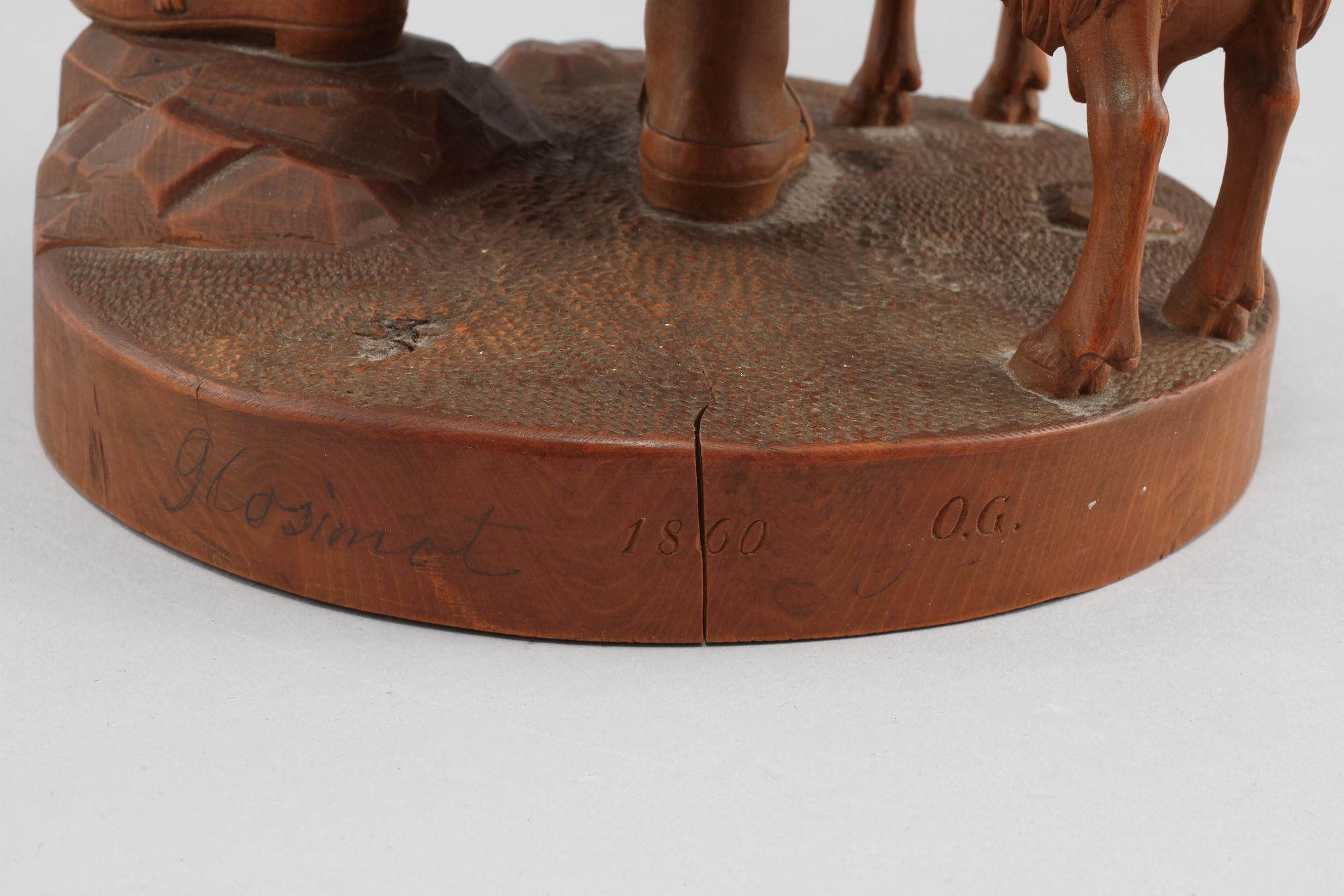 SKULPTUR, trä, monogramsignerad O.G och daterad 1860.