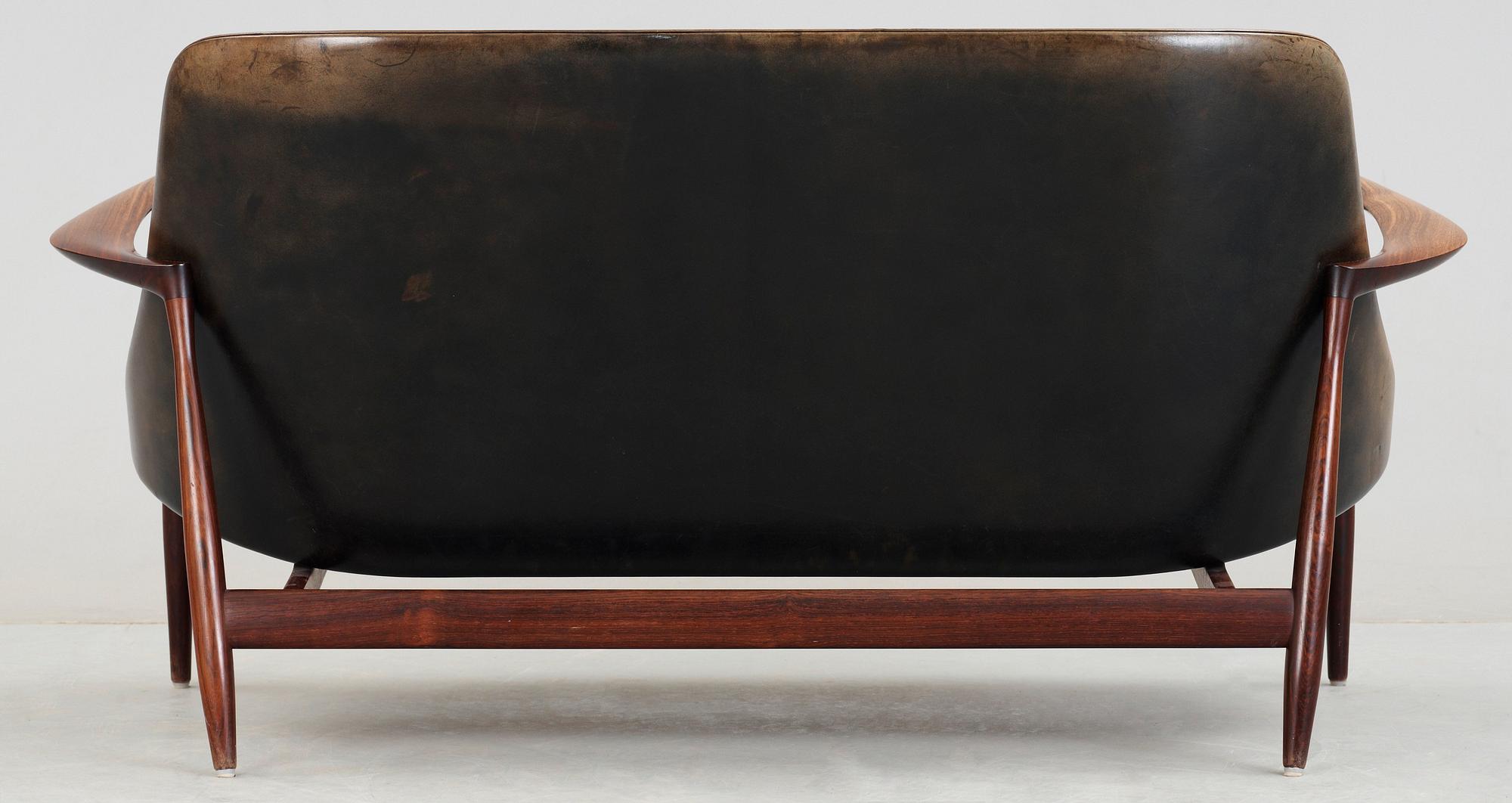 An Ib Kofod Larsen 'Elisabeth' palisander and black leather sofa, Christensen & Larsen, Denmark 1950-60's.