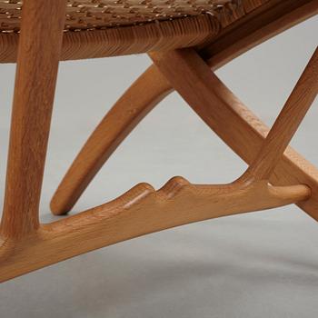 Hans J. Wegner, A pair of Hans J Wegner model 512 oak 'Folding Chairs' executed by Johannes Hansen, Denmark 1950's.