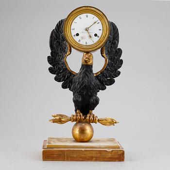 An empire mantel clock by Jacob Holmgren (Stockholm 1811-1837).