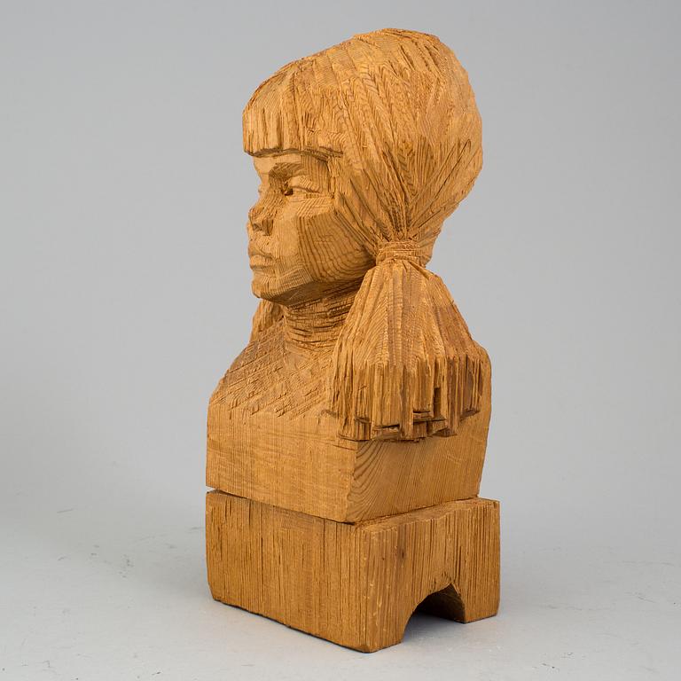 A signed wooden Per Nilsson Öst sculpture dated 69.