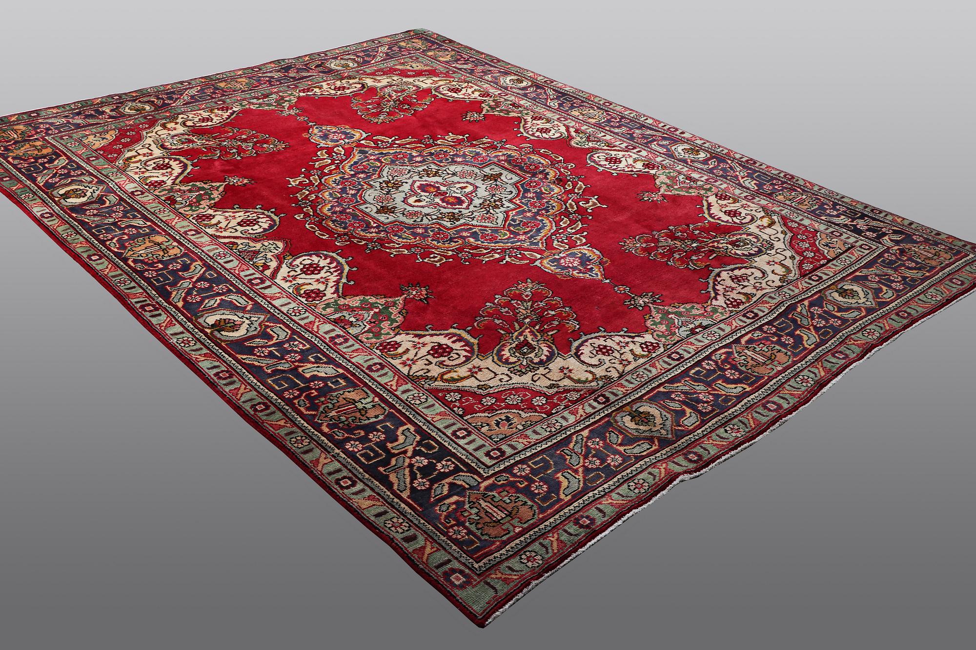 A carpet, Täbriz, 322 x 247 cm.