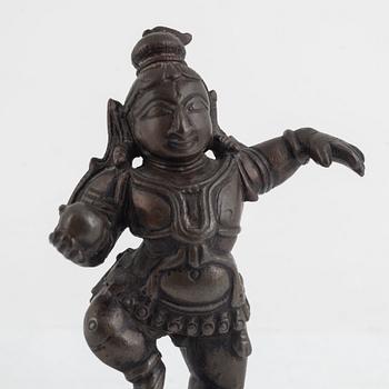 A small bronze figure of Krishna, Southern India, 16th/ 17th century.