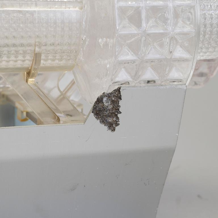 A pair of wall lamps by Gert Nyström for Fagerhult, second half of the 20th century.