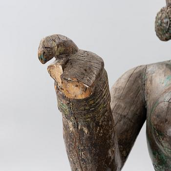 A 20th century wooden sculpture, Cambodia.