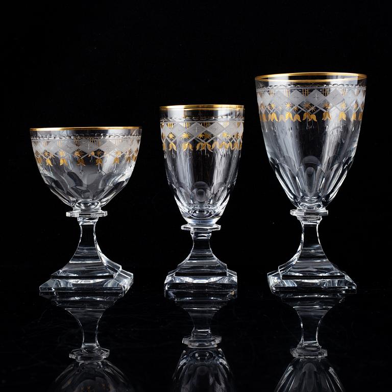 An extensive Kosta Junior glass service, 20th Century. (124 pieces).
