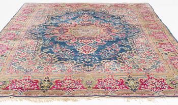 A carpet, Kerman, ca 358 x 275 cm.