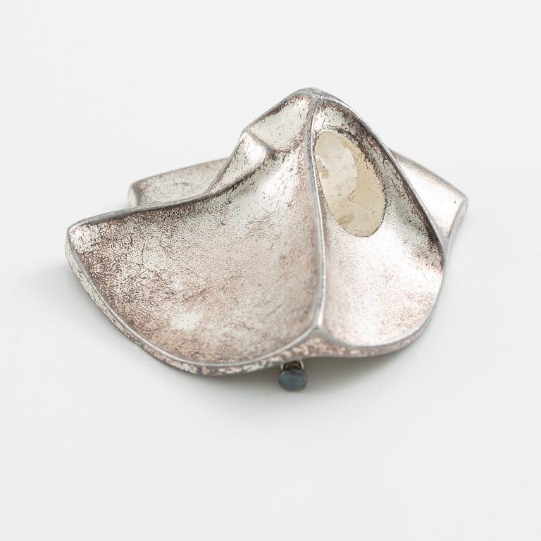 Lapponia a necklace, a pair of earrings and a brooch, sterling silver.